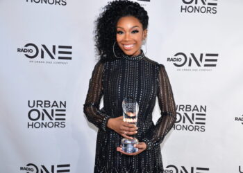Brandy receives the Cathy Hughes Excellence Award at inaugural Urban One Honors (Photo Credit: TV One)