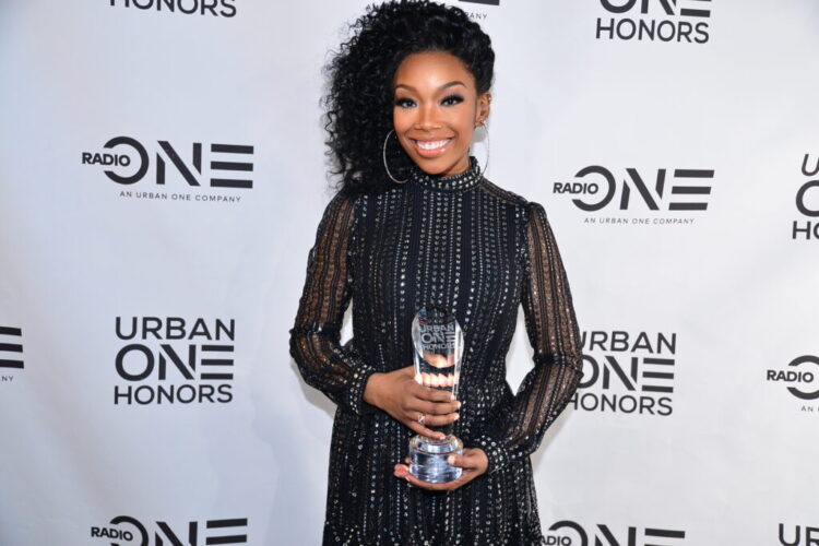 Brandy receives the Cathy Hughes Excellence Award at inaugural Urban One Honors (Photo Credit: TV One)