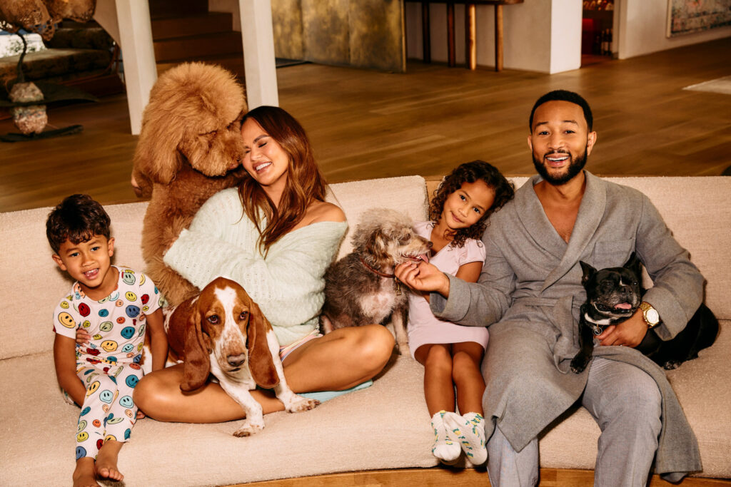Chrissy Teigen, John Legend, their kids and dogs. (Courtesy of Kismet)