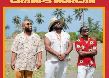 Promotional image featuring Louis York and Gramps Morgan. The three musicians stand together outdoors, smiling under a clear sky, with palms and tropical scenery in the background. Text on the image reads: "LOUIS YORK GRAMPS MORGAN - HAVE A LITTLE LIGHT.