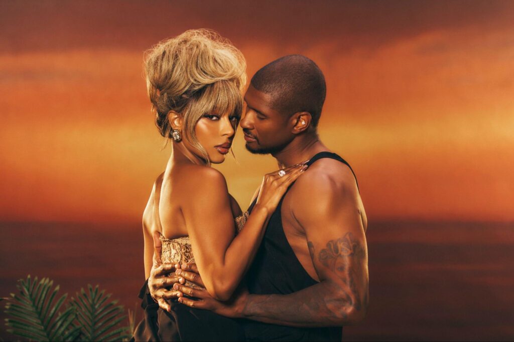 A photo of Victoria Monét and Usher
