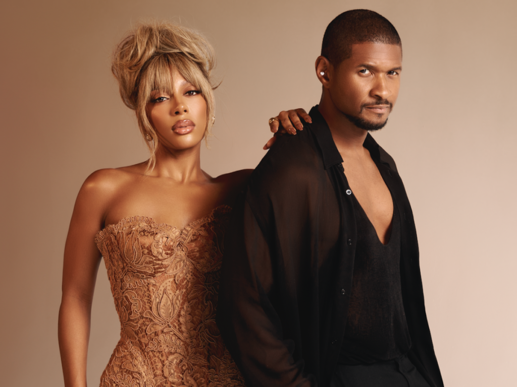 A photo of Victoria Monét and Usher.
