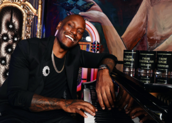 An image of singer Tyrese with his Beautiful Pain candles