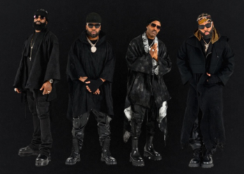 An image of R&B group Jagged Edge wearing all black attire.