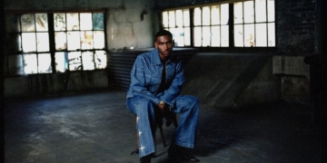 A photo of Jordan Hawkins wearing a denim outfit