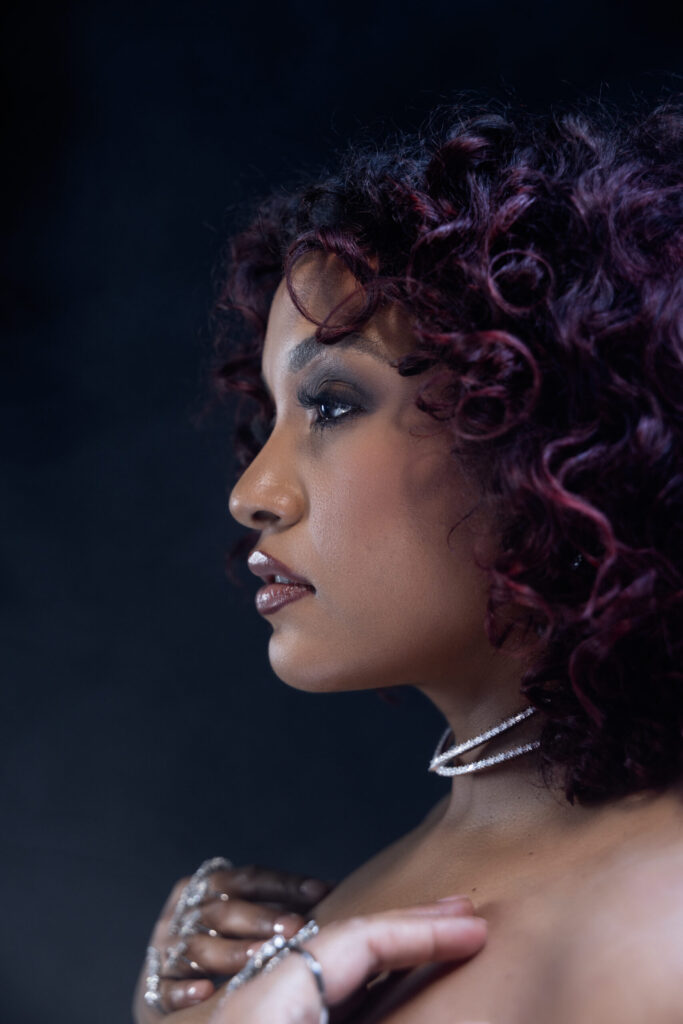 A side profile of singer Alex Isley