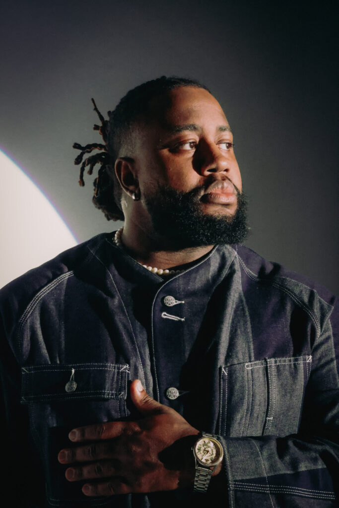 A headshot of singer Xavier Omar
