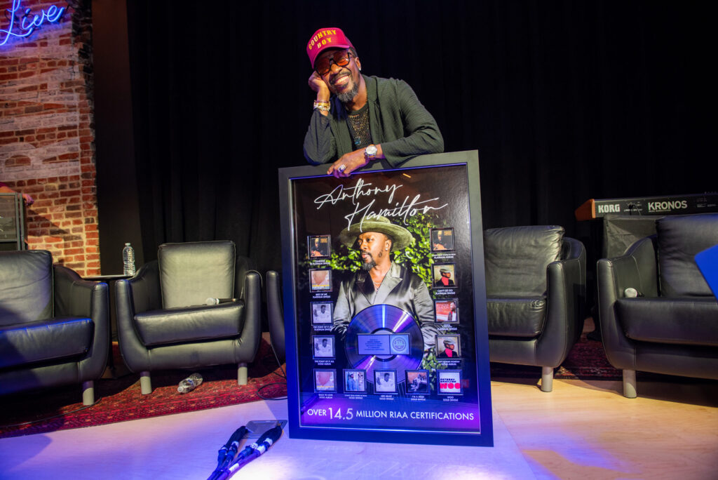 Anthony Hamilton with his RIAA plaque.