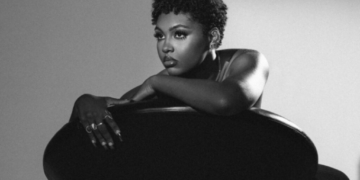 A black and white photo of singer Tiana Major9 by Myesha Evon