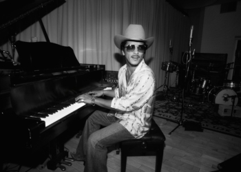 A black and white photo of Bruno Mars