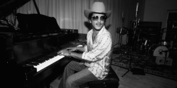 A black and white photo of Bruno Mars