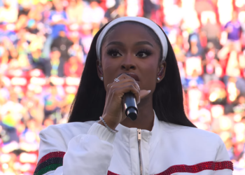 Coco Jones performs "Lift Every Voice and Sing" at Super Bowl LX.