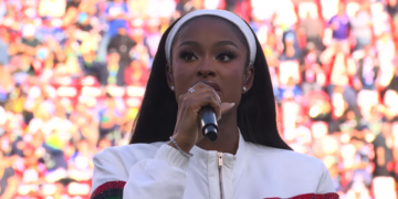 Coco Jones performs "Lift Every Voice and Sing" at Super Bowl LX.