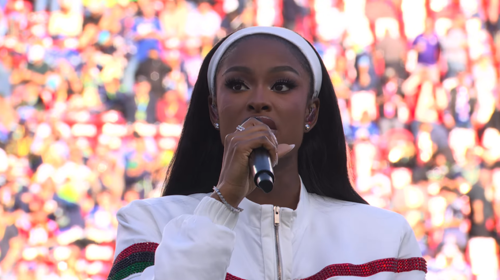 Coco Jones performs "Lift Every Voice and Sing" at Super Bowl LX.