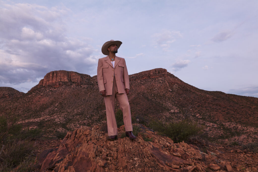A photo of Devon Gilfillian wearing a cowboy hat