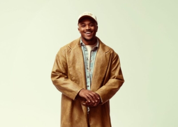 A photo of Khris Riddick-Tynes smiling