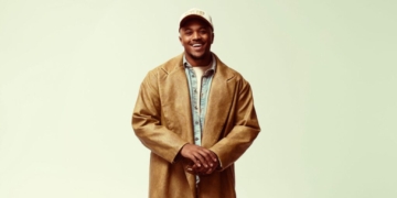 A photo of Khris Riddick-Tynes smiling
