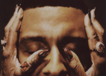 Masego's Fix Your Face album cover: featuring a close-up of his eyes closed with an elder woman's hands offering comfort